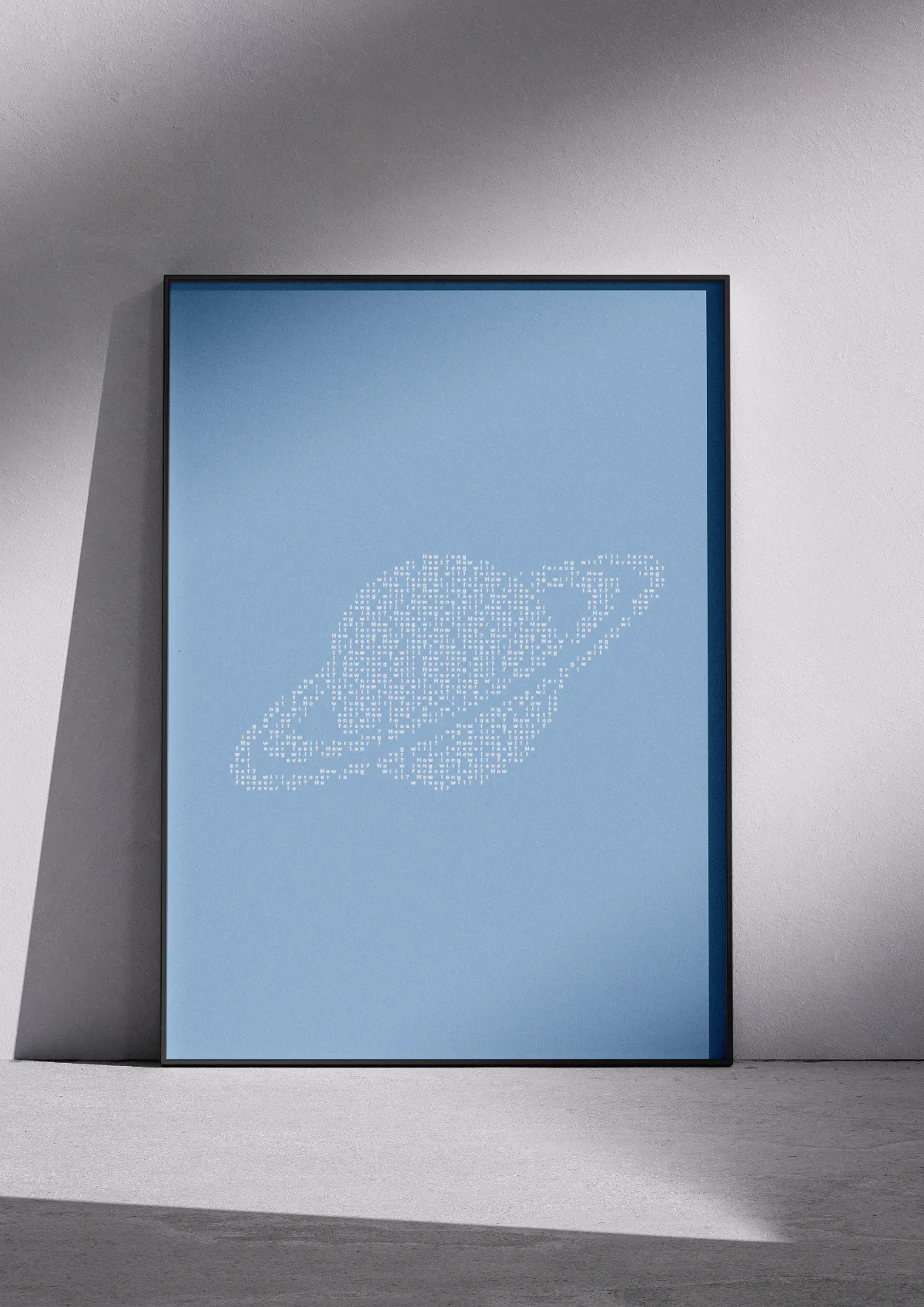 Typographic poster "Forever", white on baby blue, framed on a wall. A ringed planet.